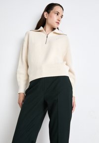 Tommy Hilfiger CORE - Vászonnadrágok - midnight moss
