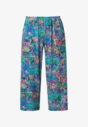 Volné kalhoty s výraznými vícebarevnými květinovými a abstraktními vzory na modrozeleném pozadí, viditelný elastický pás.