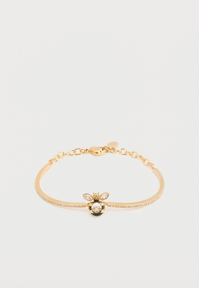 Χρυσό βραχιόλι με μενταγιόν σε σχήμα μέλισσας με κρυστάλλινα φτερά και σώμα, και λεπτή αλυσίδα με μικρούς ενσωματωμένους κρυστάλλους.