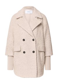 Beige, strukturierten, doppelt geknöpften Mantel mit großen schwarzen Knöpfen, Fronttaschen und kontrastierenden gerippten Manschetten. Mit einem geschlitzten Kragen.