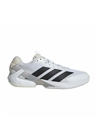 Scarpa da ginnastica bianca con tomaia in mesh, suola in gomma e tre strisce nere laterali; presenta un colletto imbottito e dettagli texturizzati.
