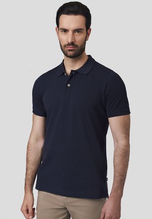 - Koszulka polo