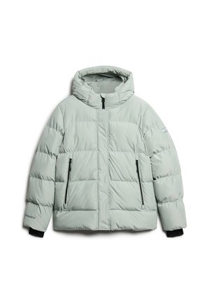 Light green puffer jacket with a hood, featuring horizontal quilted sections, black zippered pockets, and elastic cuffs for a snug fit.