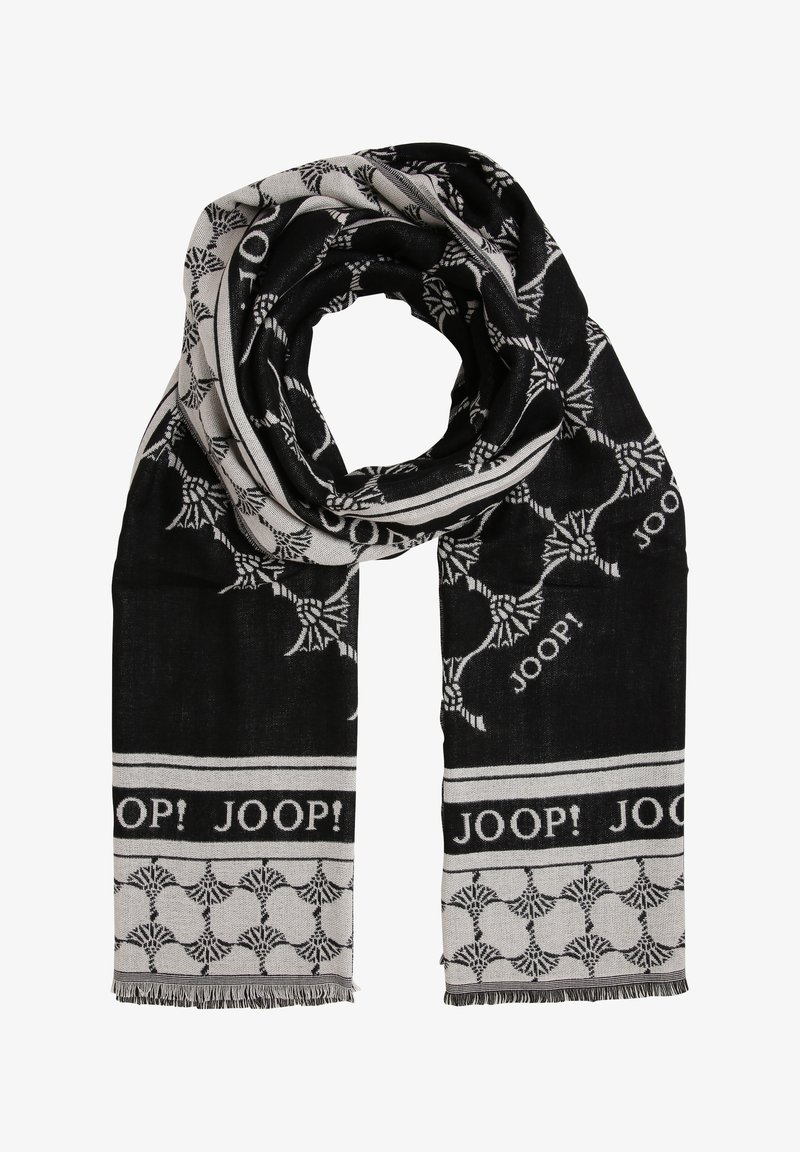 Sciarpa bianca e nera realizzata in tessuto tessuto, con un motivo di foglie stilizzate e il testo ripetuto "JOOP!" con bordi frangiati.