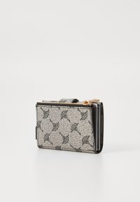 Black and white textured wallet with a patterned exterior, gold hardware, and a zip closure, featuring multiple card slots and compartments.