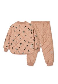 Quilted peach-colored jacket and matching pants, featuring a floral pattern in dark green and black. Elastic cuffs and waistband.