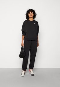 Jordan W J FLIGHT FLC PANT CORE - Träningsbyxor - black