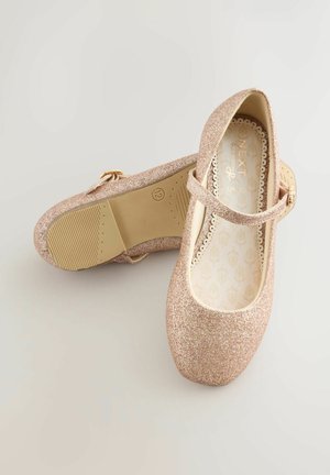 Lasten kimaltavat vaaleanpunaiset Mary Jane -kengät, joissa on solkikiinnitys, tasapohjainen kumipohja ja kukkakuosiset sisävuoret, koko UK 12.