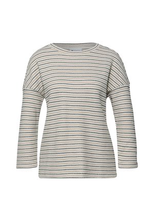 Crème trui met lange mouwen, voorzien van een klein zwart- en bruin ruitpatroon, ronde halslijn en een ontspannen pasvorm.