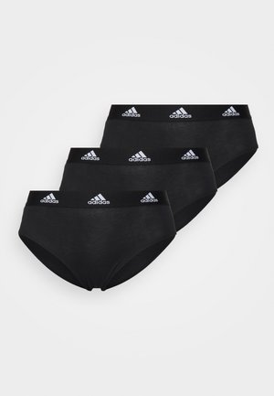 Ensemble de trois slips en coton noir, avec une taille élastique affichant le logo blanc d'Adidas. Texture lisse, conception à couverture complète.
