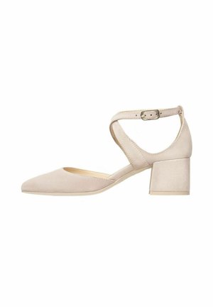 Beige suede pump with pointed toe and a low block heel. Features an ankle strap with a buckle. Smooth texture and minimalist design.