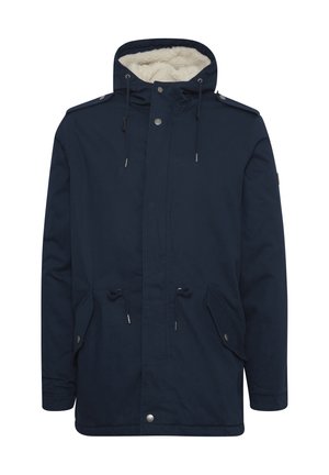 Marineblauwe parka jas met verstelbare trekkoordkap, voorzakken en een zachte binnenvoering. Voorzien van drukknoop- en ritsafsluitingen.