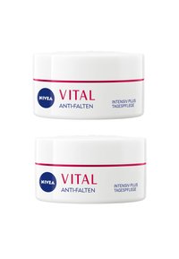 NIVEA VITAL Anti-Falten, two round white cream jars with red accents, labeled "INTENSIV PLUS TAGESPFLEGE" in blue and red text.