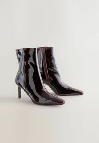 Unselected, burgundy red patent