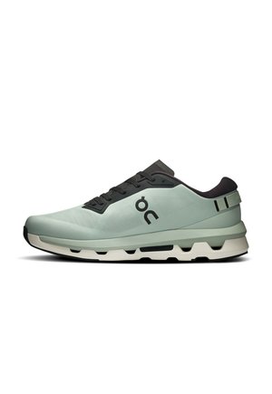 Light green athletic shoe with black laces, black interior lining, and white sole featuring unique cushioning design.
