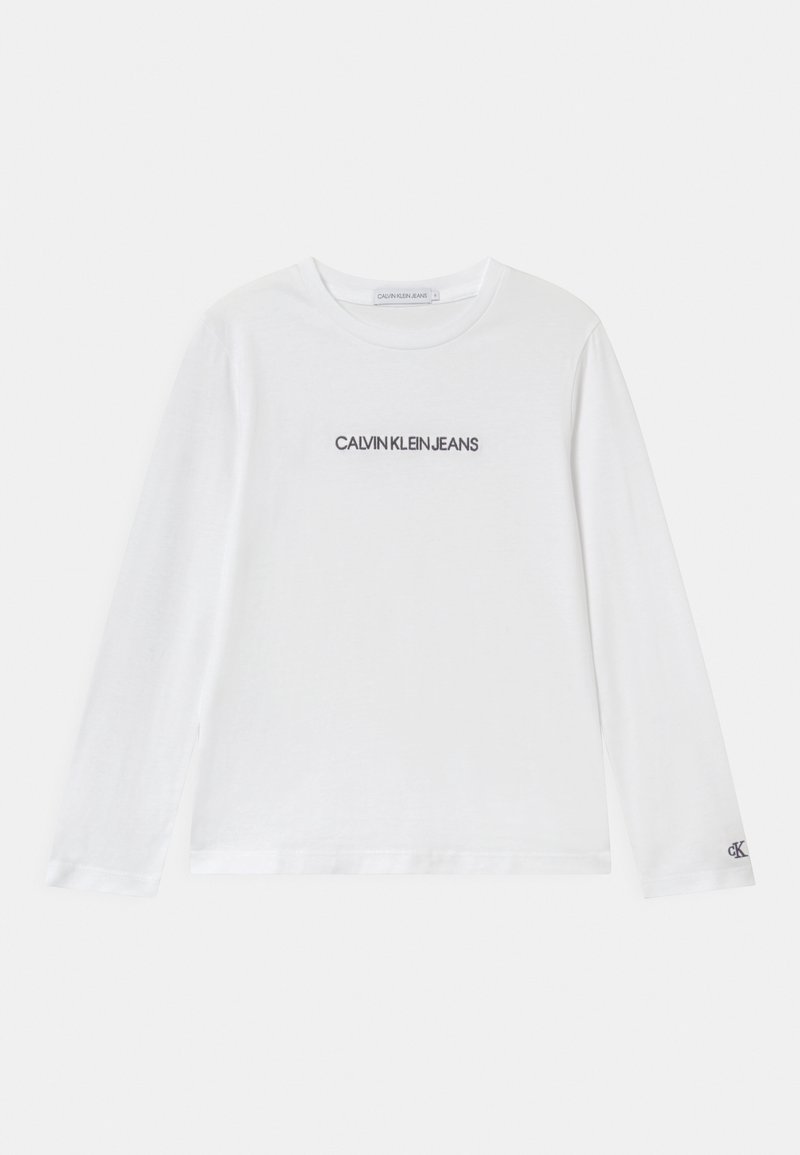Long-sleeved white cotton t-shirt featuring a black "CALVIN KLEIN JEANS" logo centered on the chest, with a small logo on the left sleeve.