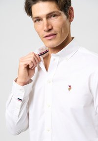 U.S. Polo Assn. CALVERT FLEX - Majica - white