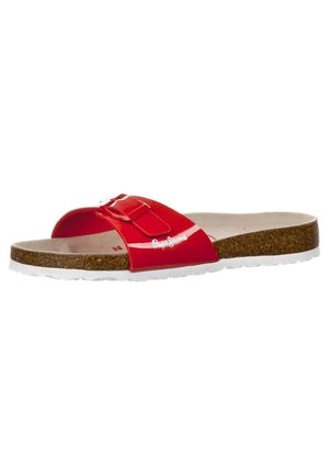 Red slide sandal with a single adjustable strap, cork footbed, white sole, and "Pepe Jeans" branding on the strap.