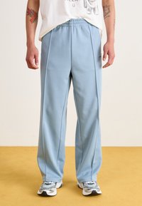 Carhartt WIP BOLAN PANT - Joggebukse - dusty ice/positano