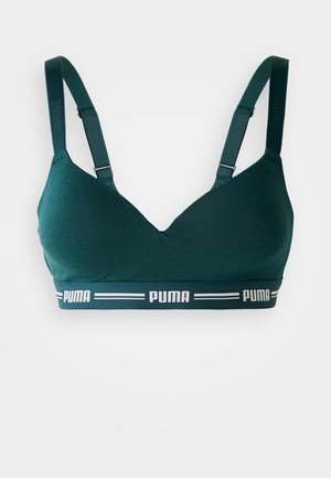 Dark green padded bra with adjustable straps and elastic band featuring white Puma logos and stripes on a white background.