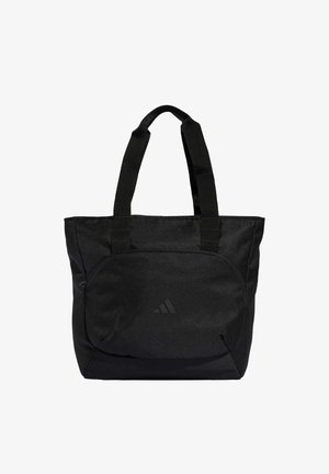 Black tote bag made of durable fabric, featuring two sturdy handles, a zippered front pocket, and a subtle logo on the front.