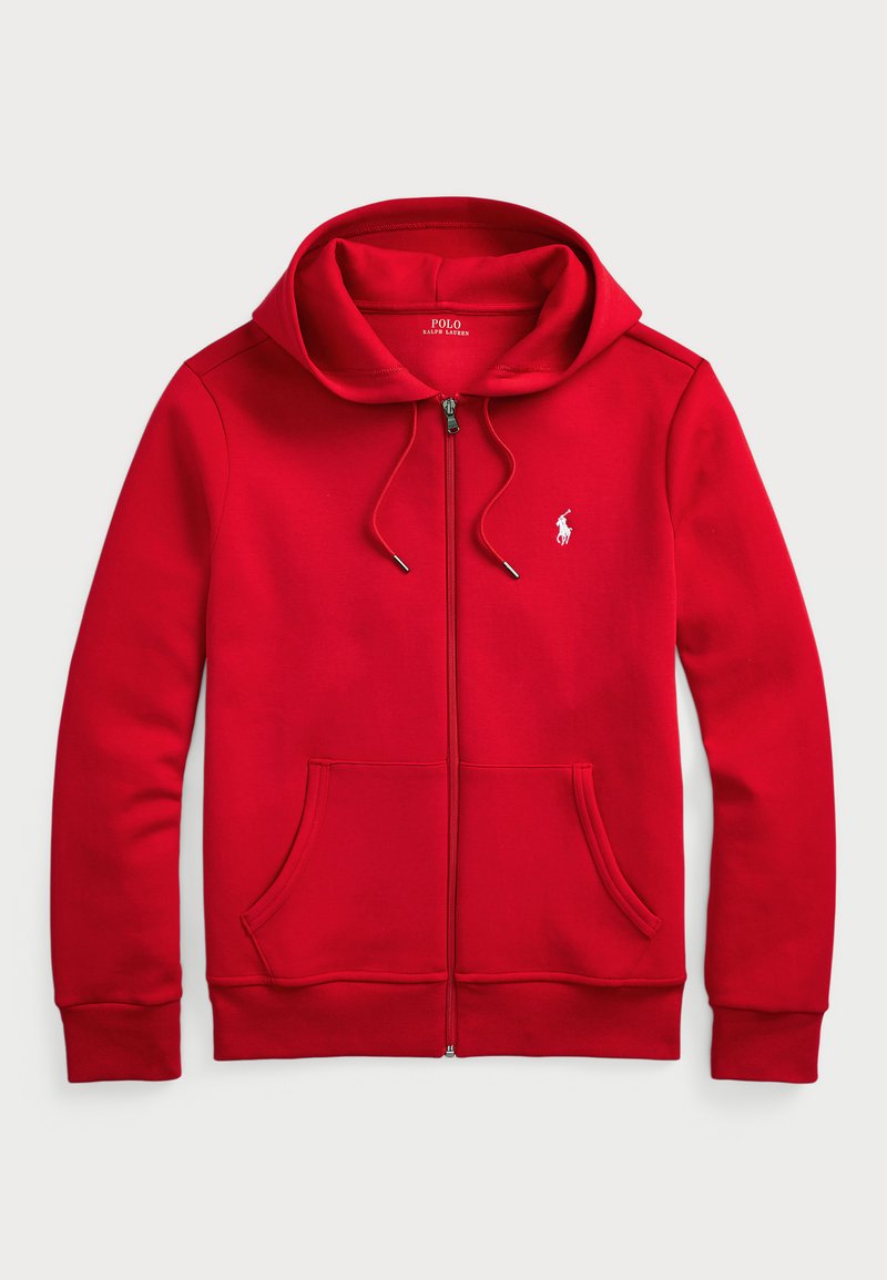 Červená mikina s kapucí na zip vyrobená z bavlněné směsi, s předním zipem, stahovací kapucí a dvěma bočními kapsami, s bílým logem na hrudi.