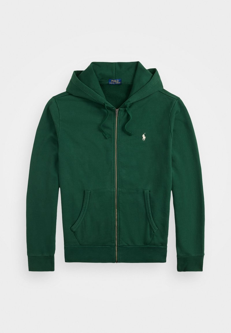 Tmavozelená mikina na zips s prednými vreckami, sťahovacími šnúrkami a malým bielym logom na ľavej strane hrudníka.