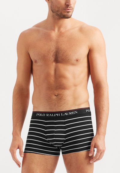 Boxeri din bumbac cu dungi negre și albe, cu un bandă elastică personalizată ce poartă inscripția "POLO RALPH LAUREN." Textură netedă, design ajustat.