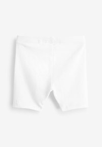 Shorts en coton blanc avec une texture lisse, une taille élastique et un design simple de shorts avec des ourlets finis.