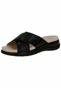 Černé kožené pantofle s překříženými pásky, polstrovanou béžovou stélkou a nízkou černou gumovou podrážkou. Kulatá špička a hladký povrch.