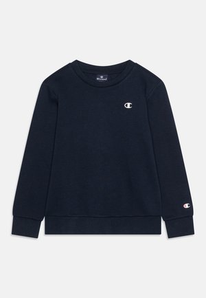 Sweatshirt bleu marine en tissu doux, avec un col rond et des manches longues. Comprend un petit logo sur la poitrine et la manche.