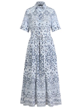 Shirt dress in white fabric adorned with blue floral and paisley patterns, short sleeves, collared neckline, and cinched waist detail.