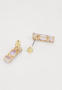Gold-tone earrings featuring rectangular lavender faceted stones in a geometric design with post back closures and a textured finish.