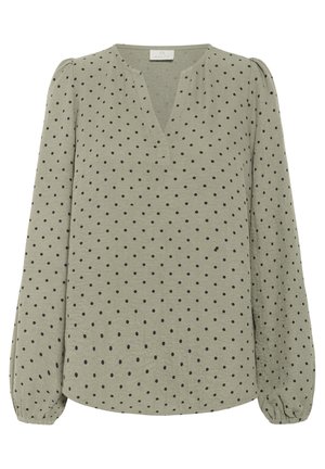 Žalia bluzonė su V formos iškirpte, ilgomis pūstomis rankovėmis ir juodais taškeliais. Minkšta tekstūra su susiraukšlėjusiomis rankogaliais ir laisvu siluetu.