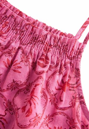 Rosa Stoffoberteil mit einem gerafften Oberteil, das mit einem roten Hummer-Druck und wirbelnden dekorativen Mustern versehen ist. Dünne Schulterträger sind enthalten.