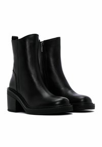 Black leather ankle boots with a rounded toe, side zipper, and a chunky block heel. Smooth texture and minimal design without embellishments.