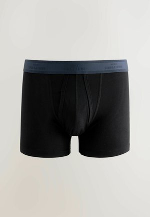 Melni kokvilnas bokseru šorti ar zilu elastīgu jostasvietu, piedāvājot pielāgotu dizainu un gludu tekstūru, ideāli piemēroti ikdienas valkāšanai.