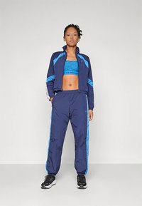 Under Armour UA ICON CRINKLE  - Športna jakna/jopica - washed navy