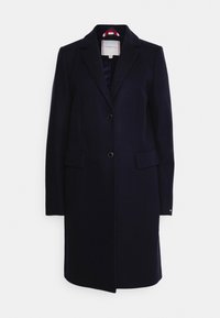Cappotto in misto lana blu navy con un design strutturato, rever a notched, due tasche frontali, chiusura con un solo bottone e una fodera interna a strisce.