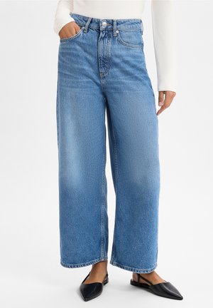 Flared Jeans - bleached denim