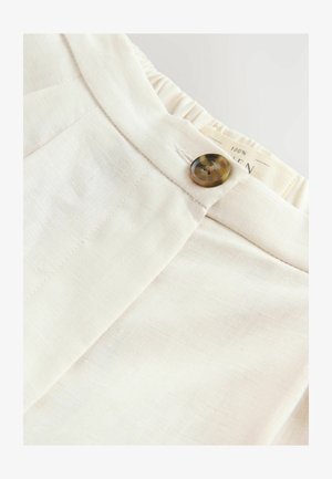 Pantaloni in lino color beige chiaro con frontale piatto, dotati di chiusura con bottone marrone e cintura elastica per un comfort ottimale.