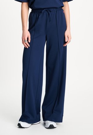POM Amsterdam, PANTS - SAAR ETERNAL BLUE - Trainingsbroek - blue