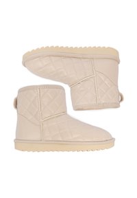 Botas de tobillo acolchadas en color beige con material texturizado, forma redondeada y suela de goma suave. Incluyen una pequeña lengüeta en la parte posterior.