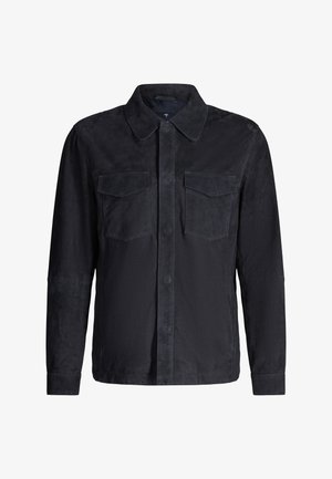 Schwarze Wildlederjacke mit langen Ärmeln, spitzem Kragen, Knopfleiste vorne und zwei Brustklappentaschen.