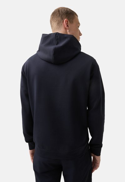 Navy hoodie with a hood, made of soft fabric; features ribbed cuffs and hem; seamless back design; no visible logos or patterns.