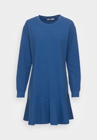 Sininen pitkähihainen mekko, joka on valmistettu pehmeästä kankaasta, pyöreä kaula-aukko ja levenevä, kerrostettu helma. Yksinkertainen ja rento muotoilu.