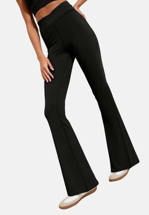 STUDIO YOGA FLARE  - Leggings - Pantaloni - black