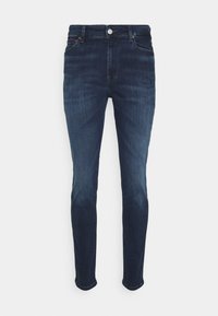 Mörkblå denimjeans med slim fit, som har en standard femficksdesign, metallknappsstängning och subtil blekning på benen.