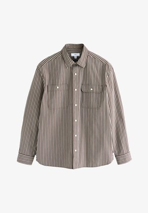 Camicia a maniche lunghe a righe in marrone e crema, con colletto a punta, due tasche frontali e orlo dritto. Tessuto in cotone.