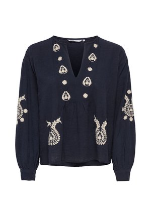 Tumši zila blūze ar garām piedurknēm, priekšpusē, piedurknēs un ap kakla izgriezumu ar krēmkrāsas ziedu izšuvumiem, V veida izgriezumu un piegrieztu vidukļa detaļu.